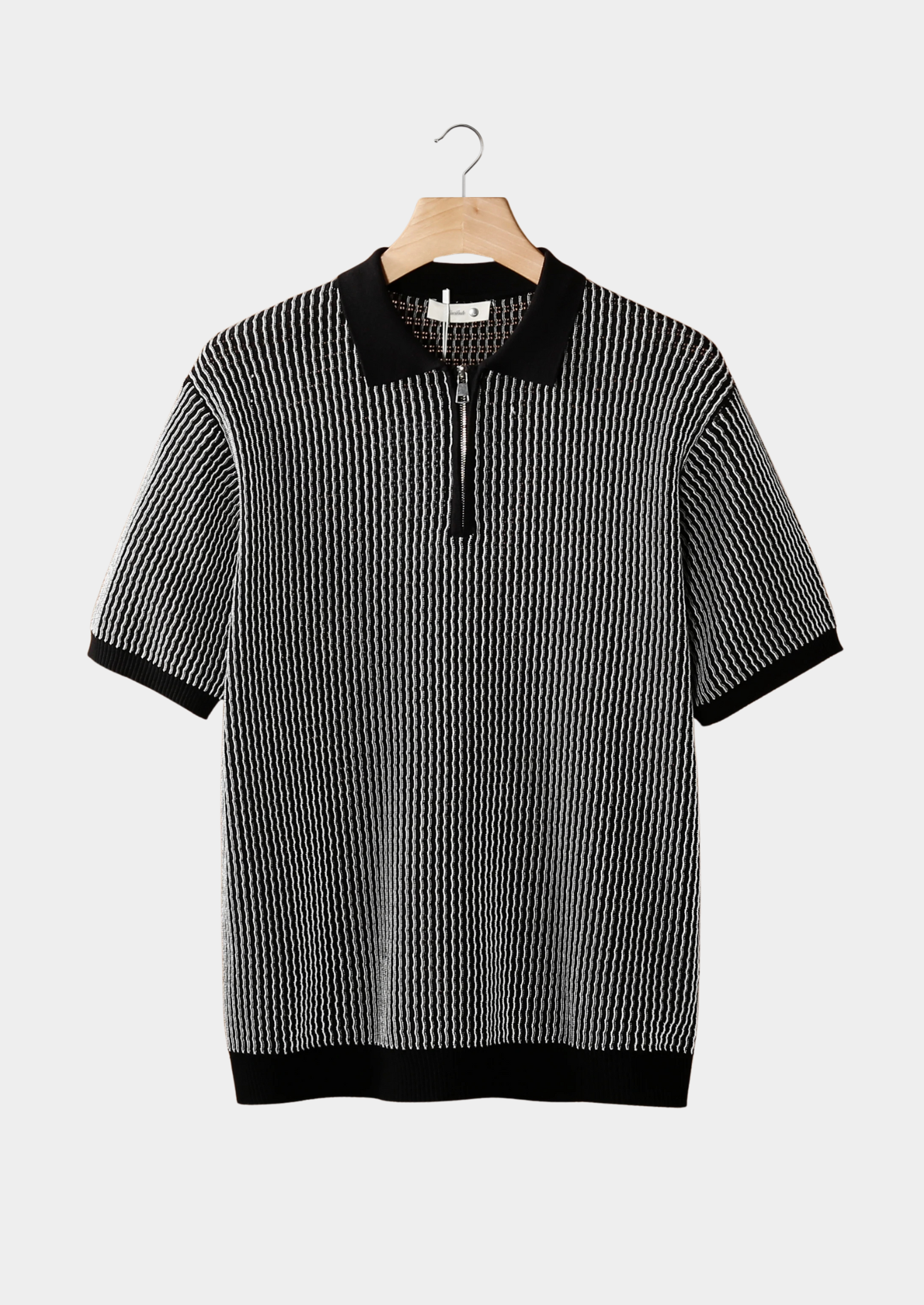 POLO ZÍPER TEXTURA GEOMÉTRICA PRETO